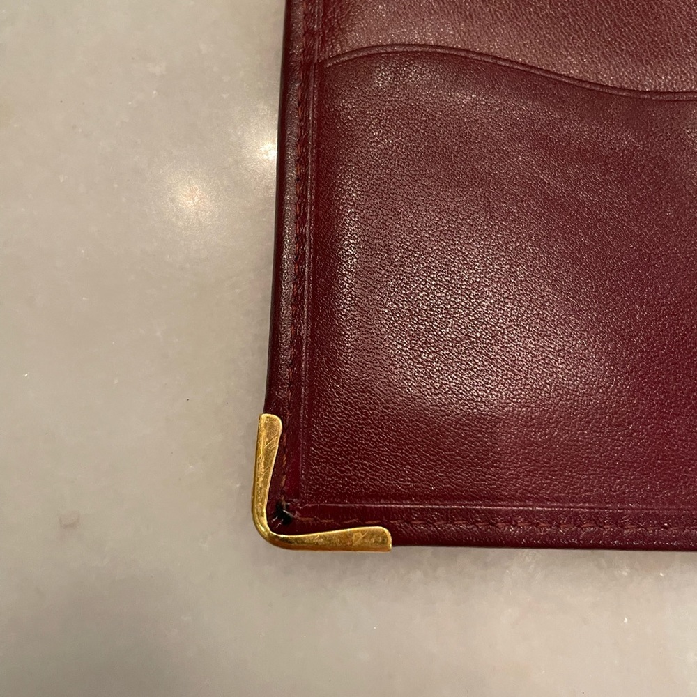 Burgundy Must de Cartier Travel passport/address book holder or check book